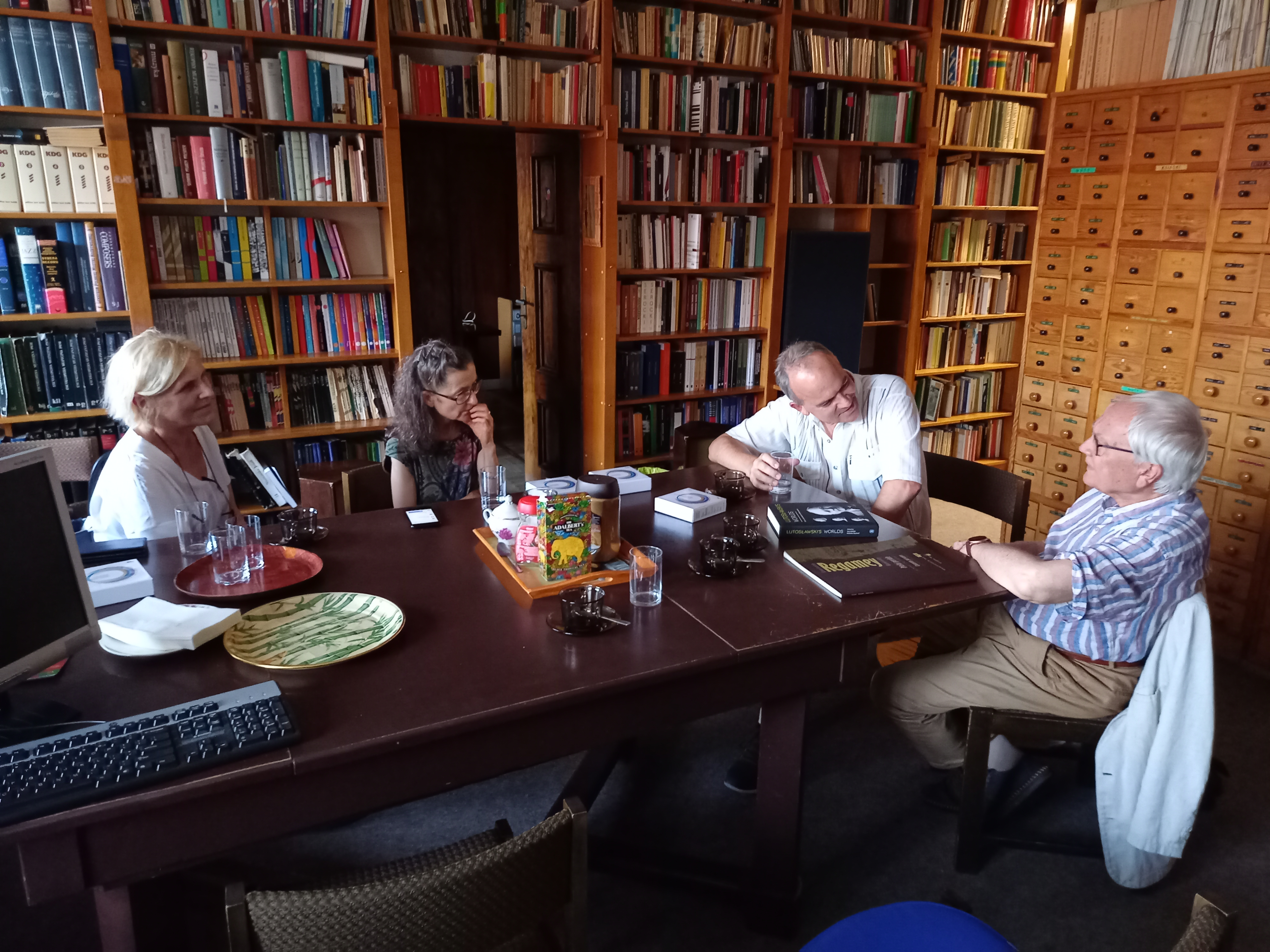 A photo - Guests sitting by the table